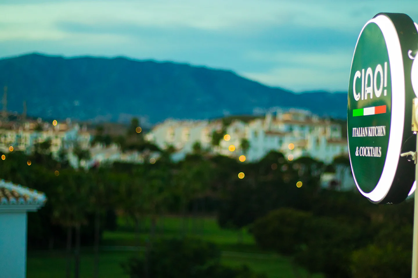 Ciao! sign at dusk with Miraflores views